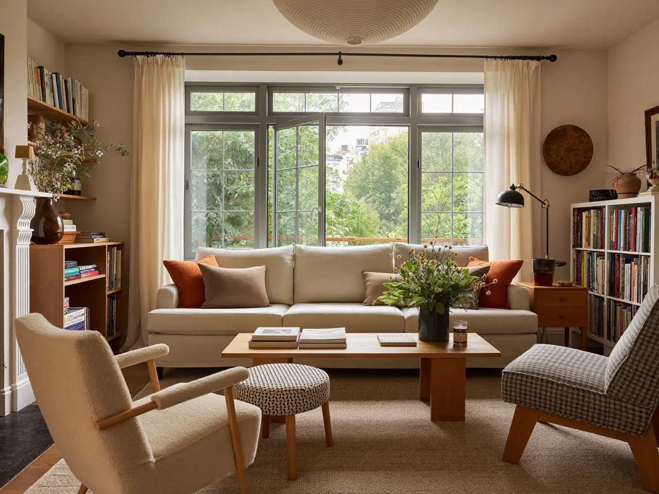 Warm living room lit by a large double glazed window